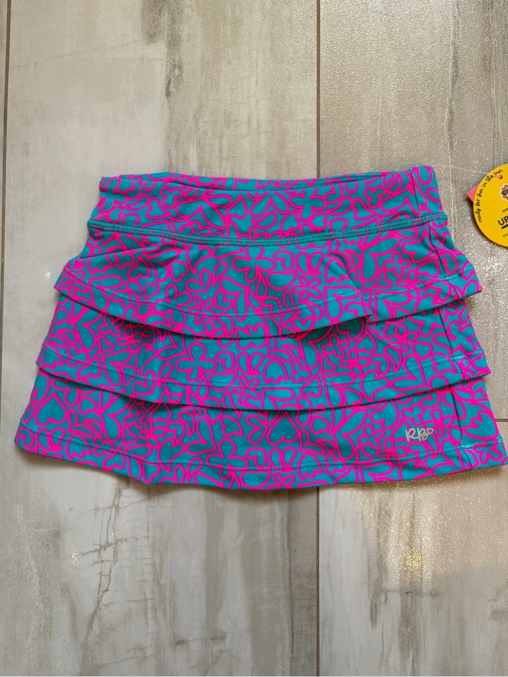 NWT RuffleButts Colorful Neon Glow Tiered Ruffled Active Skort Girls 2T
